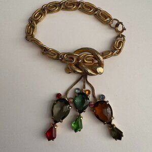 Vintage 60s Schiaparelli signed charm bracelet in gold tone & multicolor stones